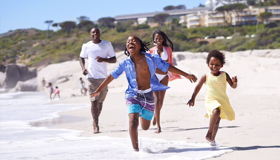 Vacation-loans-helped-this-family-running-down-the-beach-enjoy-their-vacation-together-stress-free.