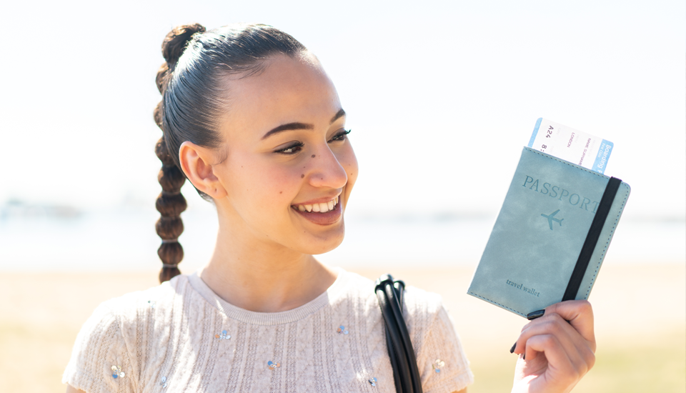 Woman-with-passport-is-thinking-about-identity-theft-and-how-to-keep-her-information-safe.